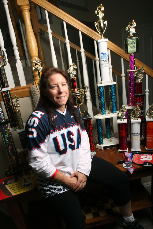 Francisco Kjolseth  |  The Salt Lake Tribune
In just two years of racing BMX bikes, Redwood Elementary third-grade teacher Bethanne Doppelt of Sandy has already accumulated a large collection of trophies. The Sandy woman's love of competitive bicycling drove her to suit up and compete with team USA in the recent weeklong international BMX race in London, England. The 49-year-old Doppelt, competed in the 30 and over women cruiser division. She has been ranked number one in the nation. Students at her West Valley City school recently got to see their teacher in action, during a demonstration where they watched her reach speeds of 22 mph in a 50-yard stretch.