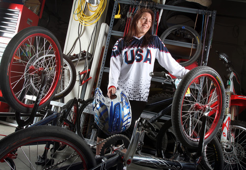 Francisco Kjolseth  |  The Salt Lake Tribune
When she isn't using manipulatives to teach math concepts or grading papers, Bethanne Doppelt can be found racing around town on her BMX bike. The Sandy woman's love of competitive bicycling drove the third-grade teacher at Redwood Elementary to suit up and compete with team USA in the recent weeklong international BMX race in London, England. The 49-year-old Doppelt, who has been racing for two years, competed in the 30 and over women cruiser division. She has been ranked number one in the nation. Students at her West Valley City school recently got to see their teacher in action, during a demonstration where they watched her reach speeds of 22 mph in a 50-yard stretch.