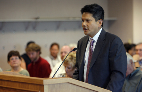 Francisco Kjolseth  |  The Salt Lake Tribune
Liquor-control commissioners vote and reveal their new director, Salvador Petilos during the Tuesday, June 26, 2012, early morning meeting at the Department of Alcoholic Beverage Control.