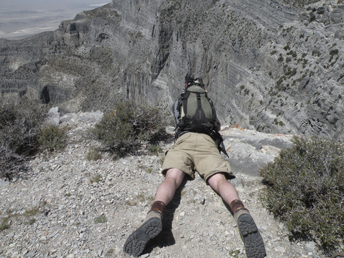 Erin Alberty  |  The Salt Lake Tribune
A hiker peers into a vertigo-causing gorge near the summit of Notch Peak.