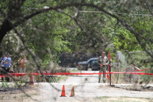Lennie Mahler  |  The Salt Lake Tribune
Police investigate the neighborhood near a canal where the body of a 6-year-old was found Tuesday, June 26, 2012.
