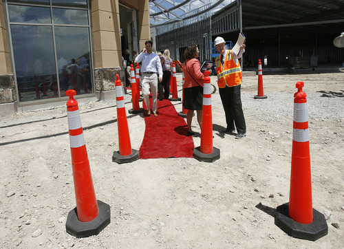 Scott Sommerdorf  |  The Salt Lake Tribune             
The red carpet was rolled out amidst the construction site as The Outlets at Traverse Mountain announced an expansion and new retailers, Thursday, June 28, 2012.