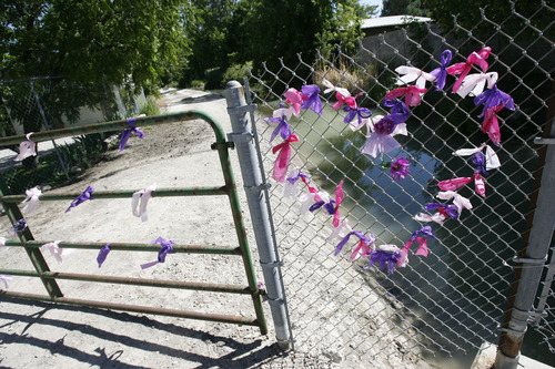 Francisco Kjolseth  |  The Salt Lake Tribune
Memorials are put up in the neighborhood around Sierra Newbold's home on Wednesday, June 27, 2012, in West Jordan after she was found dead yesterday morning in a canal near her home after her mother discovered she was missing. A recent autopsy confirmed she had been sexually assaulted and murdered.