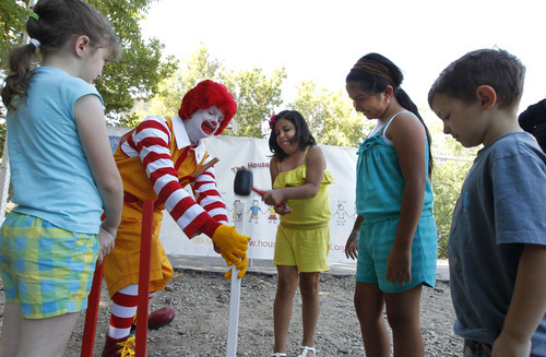 Al Hartmann  |  The Salt Lake Tribune
Ronald McDonald holds the final perimeter stake that outlines the boundary of the new Ronald McDonald House to be built at 900 E. South Temple in Salt Lake City. Children who have stayed with their families at the older existing house each gave the stake a whack. Construction begins later this summer. The new facility will connect to the older house.