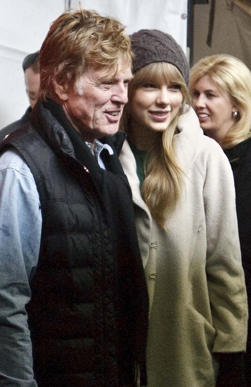 Leah Hogsten | The Salt Lake Tribune  
Sundance Film Festival President and Founder Robert Redford greets singer Taylor Swift Friday, January 20, 2012 prior to the screening of 
