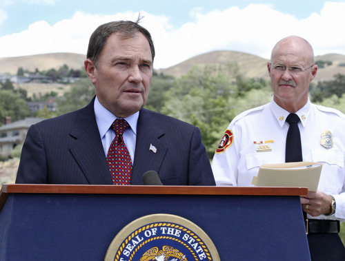 Lennie Mahler  |  The Salt Lake Tribune
Utah Gov. Gary Herbert, along with Fire Marshal Brent Halladay, urges Utahns to use caution and follow local restrictions when setting off fireworks in the dry conditions for the upcoming holidays. Thursday, June 28, 2012.