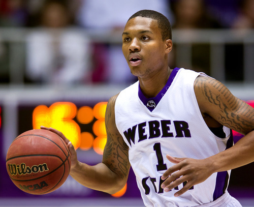 Weber State Wildcats guard Damian Lillard takes the ball down court against the Southern Utah Thunderbirds during the first half Saturday, Dec. 10, 2011, at the Dee Events Center in Ogden, Utah. (© 2011 Douglas C. Pizac/Special to The Tribune)