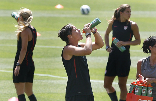 Scott Sommerdorf  |  The Salt Lake Tribune             
Abby Wambach hydrates prior to the U.S. Women's national soccer team's final practice Friday, June 29, 2012 in advance of its Olympic send-off match against Canada at Rio Tinto Stadium on Saturday. The practice session was open to the public.