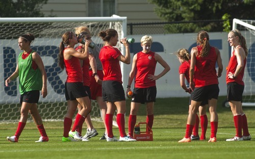 Chris Detrick  |  The Salt Lake Tribune
Alex Morgan and other members of the U.S. Women's national soccer team gulp water during practice at American First Field Thursday June 28, 2012. They will play Canada at Rio Tinto Stadium on Saturday