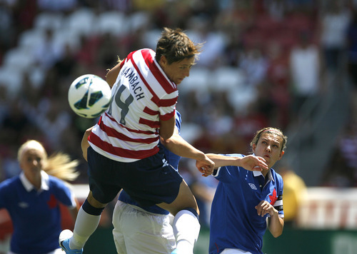 Scott Sommerdorf  |  The Salt Lake Tribune             
USA forward Abby Wambach (14) misses on a header attempt on a corner-kick during first half play. The U.S. women's national team held a 1-0 lead at the half over Canada in its final match before going to the London Olympics, Saturday, June 29, 2012.
