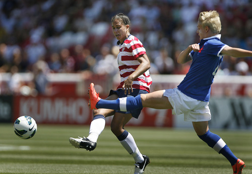 Scott Sommerdorf  |  The Salt Lake Tribune             
USA midfielder Shannon Boxx (7) fights for the ball during first half play. The U.S. women's national team beat Canada 2-1 in its final match before going to the London Olympics, Saturday, June 30, 2012.