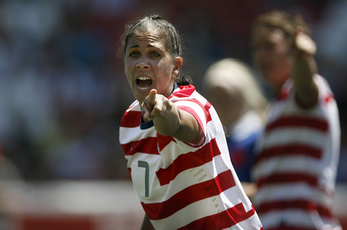 Scott Sommerdorf  |  The Salt Lake Tribune             
USA midfielder Shannon Boxx (7) points for a corner kick during first half play. The U.S. women's national team beat Canada 2-1 in its final match before going to the London Olympics, Saturday, June 30, 2012.