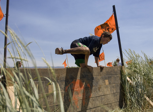 Kim Raff | The Salt Lake Tribune
Kids jump over obstacles during the 1 mile Kids Fit Varsity Spartan Race at Soldier Hollow in Midway on Saturday, June 30, 2012.