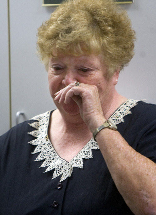Kim Raff  |  The Salt Lake Tribune
Laretta Beesley, mother of UHP trooper Aaron Beesley, who died during a search and rescue operation, becomes emotional during a press conference about her son's death at the UHP's section 3 office in Farmington, Utah on July 1, 2012.
