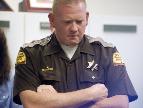 Kim Raff  |  The Salt Lake Tribune
UPH trooper Arik Beesley, brother of UHP trooper Aaron Beesley, who died during a search and rescue operation, becomes emotional during a press conference about his brother at the UHP's section 3 office in Farmington, Utah on July 1, 2012.