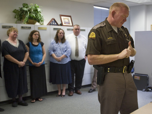 Kim Raff | The Salt Lake Tribune
UPH trooper Arik Beesley, brother of UHP trooper Aaron Beesley who died during a search and rescue operation, becomes emotional while talking about his brother's death during a press conference at the UHP's section 3 office in Farmington, Utah on July 1, 2012.