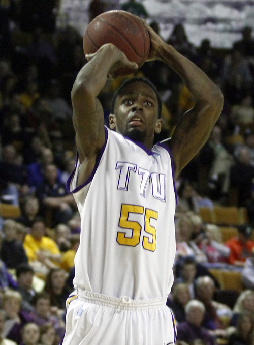 Tennessee Tech's Kevin Murphy (55) shoots in the second half of an NCAA college basketball game against Murray State on Saturday, Feb. 25, 2012, in Cookeville, Tenn. Murray State won 69-64. (AP Photo/Wade Payne)