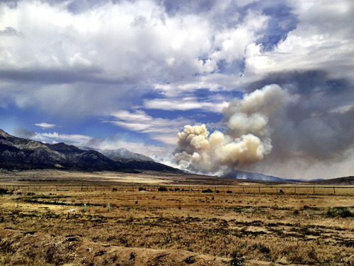 Chris Detrick  |  The Salt Lake Tribune
Smoke rises from the Clay Springs Fire near Scipio, in Millard County, Utah, on Sunday, July 1, 2012.