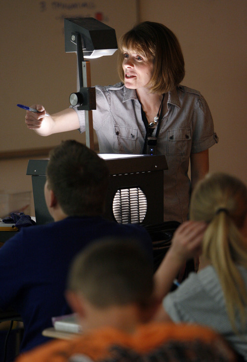 Francisco Kjolseth  |  The Salt Lake Tribune
Huntsman Award Winner, math teacher Amy Hall at Hillcrest Junior High in Murray teaches one of her Secondary Math 1 Honors class to 9th graders.