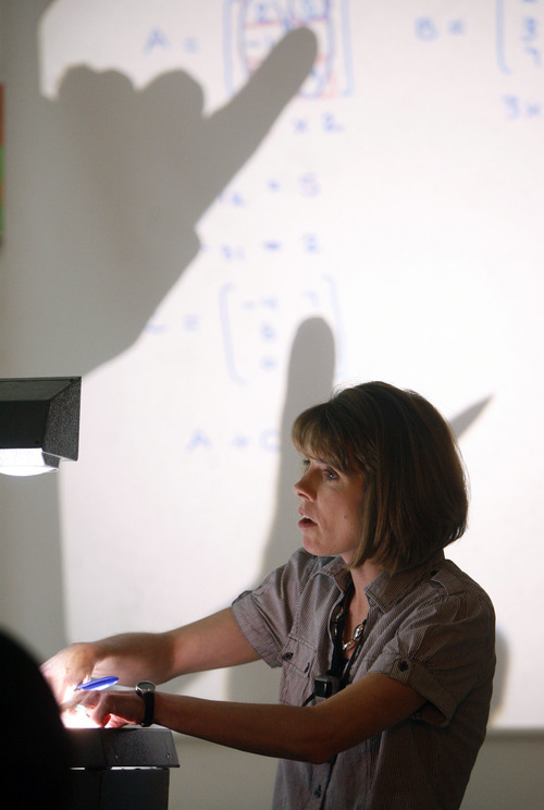 Francisco Kjolseth  |  The Salt Lake Tribune
Huntsman Award Winner, math teacher Amy Hall at Hillcrest Junior High in Murray teaches one of her Secondary Math 1 Honors class to 9th graders on Tuesday, May 8, 2012.