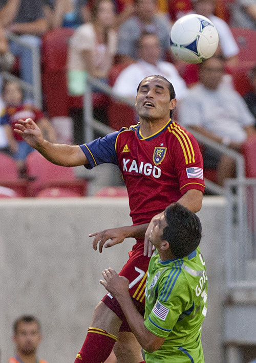 Michael Mangum  |  Special to the Tribune

Real Salt Lake forward Fabian Espindola (7) goes up for a head ball against Seattle Sounders defender Leo Gonzalez (12) during their match at Rio Tinto Stadium in Sandy, UT on Wednesday, July 4, 2012.