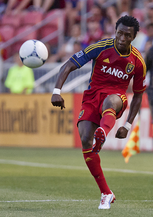 Michael Mangum  |  Special to the Tribune

Real Salt Lake defender Kenny Mansally (29) sends in a cross during their match against the Seattle Sounders at Rio Tinto Stadium in Sandy, UT on Wednesday, July 4, 2012.