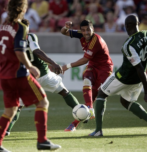 Kim Raff | The Salt Lake Tribune
Real Salt Lake player Javier Morales attempts a shot on goal as against the Portland Timbers at Rio Tinto Stadium in Sandy, Utah on July 7, 2012.