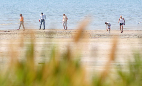 Steve Griffin | The Salt Lake Tribune

With the temperatures nearing 100 degrees the Great Salt Lake shores, near Saltair, draw people looking to cool down in Salt Lake City on Monday, July 9, 2012.