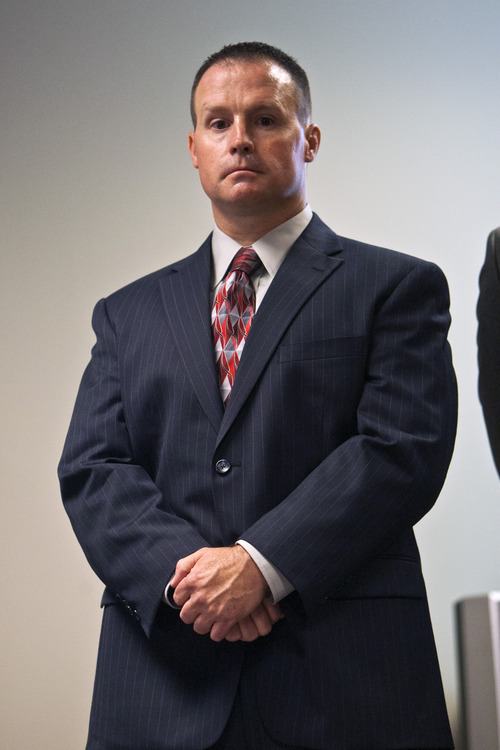 Chris Detrick  |  The Salt Lake Tribune
West Jordan police detective James Bigelow listens during a press conference at Office of the Salt Lake County District Attorney Tuesday July 10, 2012. A 41-year-old West Jordan man was charged Tuesday with the June 26 rape and murder of 6-year-old Sierra Newbold, who was found dead in a West Jordan canal. Terry Lee Black was charged with aggravated murder, child kidnapping and rape of a child.