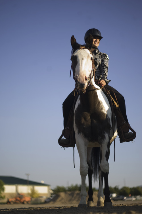 Kim Raff | The Salt Lake Tribune
Kiersten Zaelit waits on top of Zia to complete the horse trail course during the 4-H Horse Show at the South Jordan Equestrian Park in South Jordan, Utah on July 6, 2012.  This year marks the 100th anniversary of 4-H in Utah.