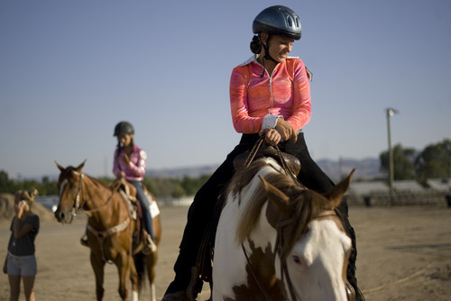 Kim Raff | The Salt Lake Tribune
Megan Larsen and Hidalgo wait to complete the horse trail course during the 4-H Horse Show at the South Jordan Equestrian Park in South Jordan, Utah on July 6, 2012.  This year marks the 100th anniversary of 4-H in Utah.