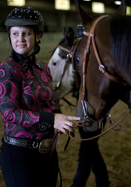 Kim Raff | The Salt Lake Tribune
McKenzie Sanders holds onto Deal during the 4-H Horse Show at the South Jordan Equestrian Park in South Jordan, Utah on July 6, 2012.  This year marks the 100th anniversary of 4-H in Utah.