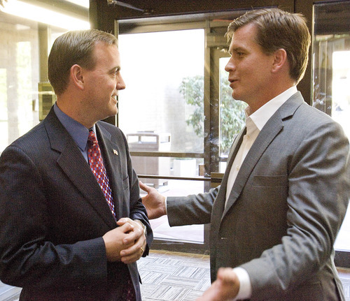 Paul Fraughton | The Salt Lake Tribune
Mike Winder, left, offers his congratulations to Mark Crockett in the lobby of the Salt Lake County Government Center, about a half hour a canvass confirmed that Crockett is the Republican nominee for Salt Lake County mayor. He is running against Democrat Ben McAdams.