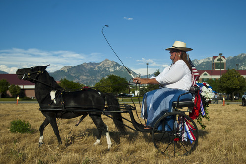 Chris Detrick  |  The Salt Lake Tribune
Pamela Bailey and her horse Wicoma, a 33-inch tall Shetland miniature stallion during the Days of '47 All-Horse Parade Tuesday July 10, 2012.