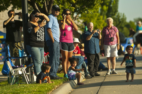 Chris Detrick  |  The Salt Lake Tribune
Spectators watch the Days of '47 All-Horse Parade Tuesday July 10, 2012.