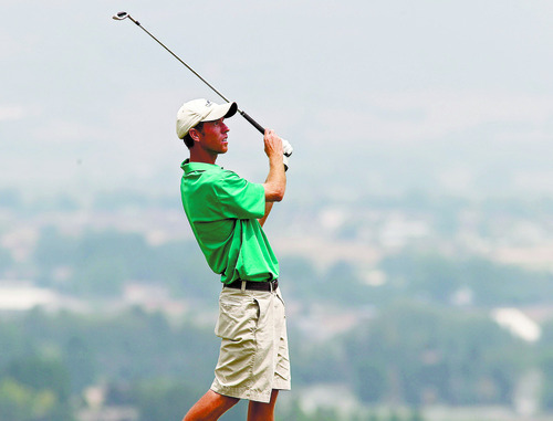 Al Hartmann  |  The Salt Lake Tribune  
Kevin Aylwin follows a shot on the eighth hole at the U.S. Amateur Public Links golf tournament at Soldier Hollow Friday July 13 during semifinal match.