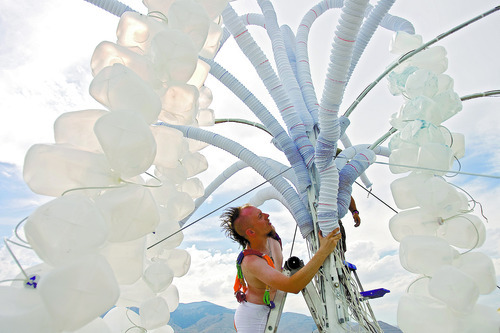 Kim Raff | The Salt Lake Tribune
The art group Forgotten Forest creates a public art display at Element 11, a regional Burning Man event, at the Bonneville Sea Base in Tooele County, Utah on July 13, 2012.