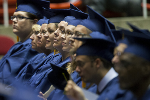 Chris Detrick  |  The Salt Lake Tribune
Students listen during Western Governors University's commencement ceremony at the Huntsman Center at the University of Utah Saturday July 14, 2012.