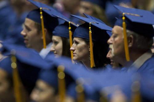 Chris Detrick  |  The Salt Lake Tribune
Students listen during Western Governors University's commencement ceremony at the Huntsman Center at the University of Utah Saturday July 14, 2012.