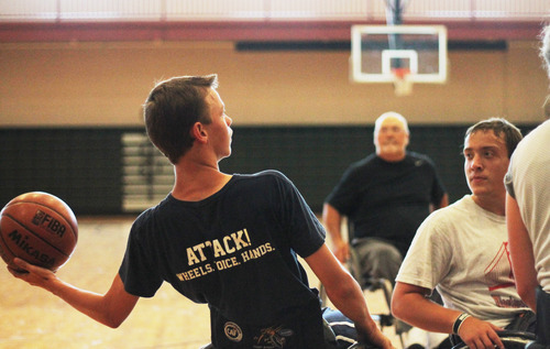 Jack Wang | The Salt Lake Tribune 
Spencer Heslop (left) looks for an open teammate while guarded by
Ryan Nelson in a summer league game at Clearfield Aquatic Center.
Heslop heads to Illinois next month, while Nelson is bound for
Wisconsin-Whitewater.