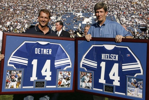 Provo - Former BYU quarterbacks Ty Detmer (left) and Gifford Nielsen's #14 was retired during a halftime ceremony. BYU vs. Arizona college football Saturday afternoon at LaVell Edwards Stadium.
Trent Nelson/The Salt Lake Tribune; 9.01.2007