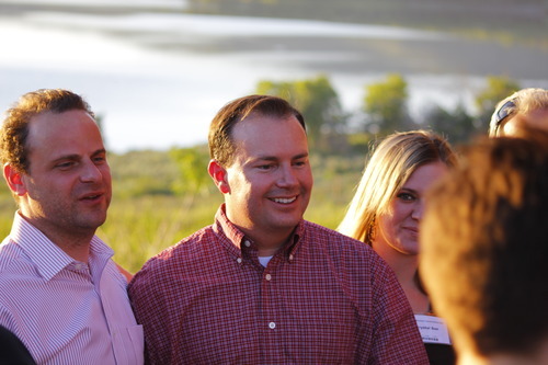Sen. Mike Lee is seen with Greg Peterson at the Rocky Mountain Conservatives barbecue held at Peterson's cabin near Heber on July 1, 2011.