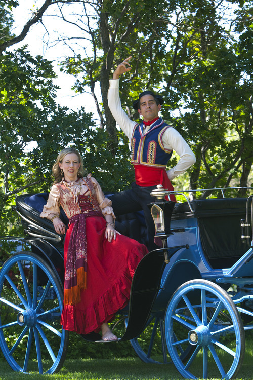 Chris Detrick  |  The Salt Lake Tribune
Opera singers Demaree Brown and Daniel Tuutau pose for a portrait Tuesday July 17, 2012. They will be singing and riding in this carriage in the Pioneer Day Parade.