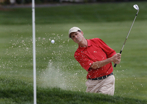 Scott Sommerdorf  |  The Salt Lake Tribune             
Salt Lake Country Club member Jon Wright pitches out of a sand trap on #3 as he won the Utah State Amateur title, Sunday, July 22, 2012 on his home course 3 and 2, over Christian Jensen of St. George.