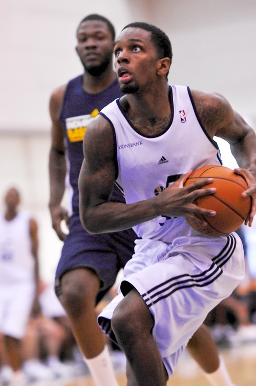 Kevin Murphy of the Utah Jazz drives to the basket against the Indiana Pacers during the Orlando Summer League games Thursday, July 12, 2012 in Orlando, Florida.  (Photo by Roberto Gonzalez|Special to the Tribune)
