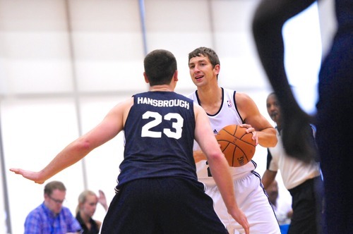 Michael Stockton, 21, of the Utah Jazz brings the ball upcourt against Ben Hansbrough, 23, of the Indiana Pacers during the Orlando Summer League games Thursday, July 12, 2012 in Orlando, Florida.  (Photo by Roberto Gonzalez|Special to the Tribune)