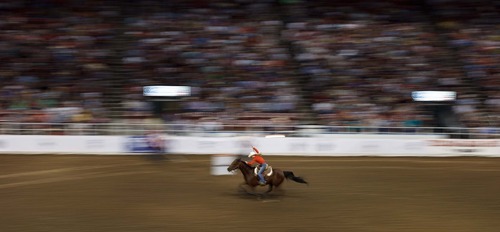 Trent Nelson  |  The Salt Lake Tribune
Lindsay Sears competes in the Barrel Racing competition at the Days of '47 Rodeo at the Maverik Center in West Valley City, Utah on Tuesday, July 24, 2012.