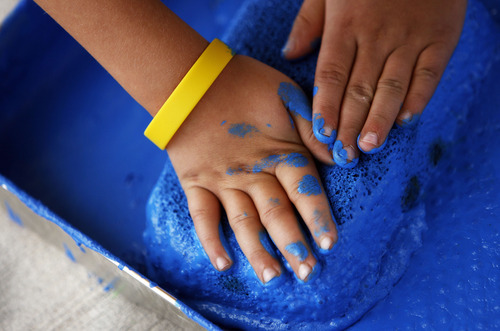 Francisco Kjolseth  |  The Salt Lake Tribune
Kids and adults of all ages brighten up a bridge as UDOT invites people to join in handprint painting for a pedestrian bridge it plans to place at 8200 South and U-111. The event is designed to help the new area take ownership of the old, recycled bridge.