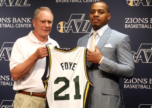 Rick Egan  | The Salt Lake Tribune 

Utah Jazz general manager, Kevin O' Connor presents Randy Foye with his new jersey, during a press conference at Zion's Bank Basketball Center, Thursday, July 26, 2012.