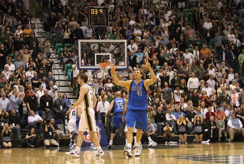 Rick Egan  | The Salt Lake Tribune 

Dallas Mavericks power forward Dirk Nowitzki (41) reacts after hitting a 3-point shot to toe the game 105 -105, with 3.9 seconds left, in NBA action, The Utah Jazz, vs. Dallas Mavericks, at the EnergySolutions Arena, Monday, April 16, 2012.